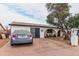 House exterior with a driveway and front patio at 5546 W Encanto Blvd, Phoenix, AZ 85035