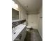 Updated bathroom featuring tile accents, white cabinets, and a shower-tub combo at 5839 E Norwood St, Mesa, AZ 85215
