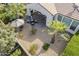 Aerial view of backyard showing patio, landscaping, and palm trees at 72 E Camellia Way, Queen Creek, AZ 85140