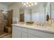 Elegant bathroom with dual sinks, a shower, and modern finishes at 72 E Camellia Way, Queen Creek, AZ 85140