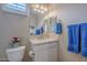 Small bathroom with toilet and single vanity at 72 E Camellia Way, Queen Creek, AZ 85140