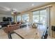 Bright dining area with large windows and wooden table at 72 E Camellia Way, Queen Creek, AZ 85140