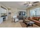 Relaxing living room featuring a fireplace and comfortable seating at 72 E Camellia Way, Queen Creek, AZ 85140