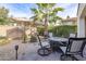 Backyard patio with seating area and fire pit at 72 E Camellia Way, Queen Creek, AZ 85140