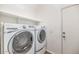 Laundry room with washer and dryer included at 7873 W Fetlock Trl, Peoria, AZ 85383