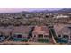 Aerial view showcasing house, pool, and neighborhood at 8537 E Leland St, Mesa, AZ 85207