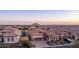 House and neighborhood view with mountain backdrop at 8537 E Leland St, Mesa, AZ 85207