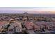 Aerial view of house and neighborhood at sunset at 8537 E Leland St, Mesa, AZ 85207