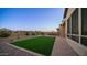 Artificial turf, brick pavers, and built-in grill at 8537 E Leland St, Mesa, AZ 85207