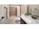 Bathroom with tub, granite vanity, and updated fixtures at 8537 E Leland St, Mesa, AZ 85207