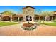 Community center with Spanish-style architecture, landscaping and a courtyard at 8537 E Leland St, Mesa, AZ 85207