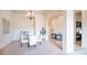 Elegant dining room with chandelier and kitchen access at 8537 E Leland St, Mesa, AZ 85207