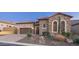 Attractive stone exterior, 2-car garage at 8537 E Leland St, Mesa, AZ 85207