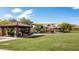 Community playground with shaded seating and play structures at 8537 E Leland St, Mesa, AZ 85207