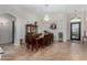 Formal dining room featuring a large wooden table and chandelier at 10040 E Grandview St, Mesa, AZ 85207