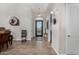 Bright and spacious entryway with tile flooring and an elegant front door at 10040 E Grandview St, Mesa, AZ 85207