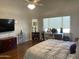 Main bedroom with hardwood floors and lots of natural light at 10040 E Grandview St, Mesa, AZ 85207