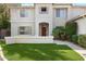 Two-story house with a manicured lawn and walkway at 1021 E Mead Dr, Chandler, AZ 85249