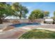 Enjoy this kidney shaped pool with waterfall feature at 1021 E Mead Dr, Chandler, AZ 85249