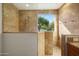 Walk-in shower with tile surround and window at 1021 E Mead Dr, Chandler, AZ 85249