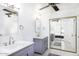 Bathroom with double vanity and mirrored closet at 1320 W Palo Verde Dr, Chandler, AZ 85224