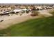 An aerial view of a lush golf course community showcasing various well-maintained homes at 13709 W Via Tercero --, Sun City West, AZ 85375