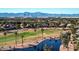 Community overview with golf course, lake and mountain views at 16807 W Berkeley Rd, Goodyear, AZ 85395