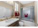 Bathroom with shower/tub combo and modern vanity at 16807 W Berkeley Rd, Goodyear, AZ 85395