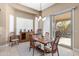 Casual dining area with sliding glass door to backyard at 16807 W Berkeley Rd, Goodyear, AZ 85395