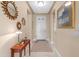 Bright entryway with decorative mirrors and console table at 16807 W Berkeley Rd, Goodyear, AZ 85395