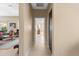 Bright hallway connecting living area to bedrooms at 16807 W Berkeley Rd, Goodyear, AZ 85395