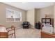 Home office with desk, chair, and built-in shelving at 16807 W Berkeley Rd, Goodyear, AZ 85395