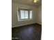 Bedroom featuring wood floors and a bay window at 1770 E Sandra Ter, Phoenix, AZ 85022