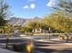 Residential community with mountain views and tree-lined streets at 20385 W Vista Paseo Dr, Buckeye, AZ 85396