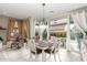 Casual dining area with table and chairs, adjacent to the kitchen at 20385 W Vista Paseo Dr, Buckeye, AZ 85396