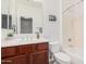 Bathroom with single vanity, shower/tub combo and toilet at 2133 E La Salle St, Phoenix, AZ 85040