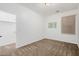 Bedroom with carpet and walk-in closet at 2133 E La Salle St, Phoenix, AZ 85040