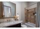 Clean bathroom with a shower and stone countertop at 26872 N 102Nd St, Scottsdale, AZ 85262