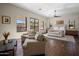 Main bedroom with sitting area and access to private patio at 26872 N 102Nd St, Scottsdale, AZ 85262