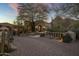 Elegant home with stone and stucco exterior and desert landscaping at 26872 N 102Nd St, Scottsdale, AZ 85262