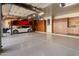 Spacious garage with car lift and ample storage at 26872 N 102Nd St, Scottsdale, AZ 85262