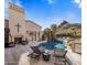 Relaxing pool area with fireplace and mountain views at 26872 N 102Nd St, Scottsdale, AZ 85262