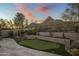 Landscaped putting green with mountain views at 26872 N 102Nd St, Scottsdale, AZ 85262