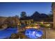 Enjoy this luxurious spa and hot tub at night at 26872 N 102Nd St, Scottsdale, AZ 85262