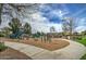 playground with play structures and shaded area at 4132 E Santa Fe Ln, Gilbert, AZ 85297