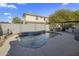 Inviting kidney shaped pool with waterfall feature at 4132 E Santa Fe Ln, Gilbert, AZ 85297