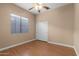 Bedroom with wood floors and double closet at 4742 S Primrose Dr, Gold Canyon, AZ 85118