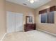 Bedroom with wood floors and double closet at 4742 S Primrose Dr, Gold Canyon, AZ 85118