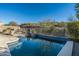 Sparkling pool with a spacious deck and mountain views at 4742 S Primrose Dr, Gold Canyon, AZ 85118