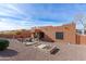 Backyard with patio furniture, raised garden beds at 6131 S Eagle Pass Rd, Gold Canyon, AZ 85118